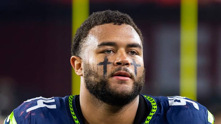 Seattle Seahawks defensive end Mike Morris stands on the field