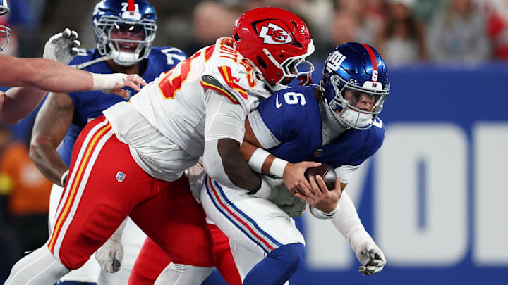 Kansas City Chiefs defensive tackle Omarr Norman-Lott (55) tackles New York Giants quarterback Jaxson Dart (6) in the third quarter at MetLife Stadium.