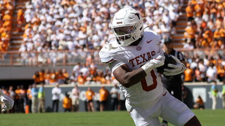 Texas Longhorns running back Raleek Brown (0) runs against Tennessee Volunteers linebacker Amare Campbell (0) during the second half at Neyland Stadium. Texas Longhorns running back Raleek Brown (0) runs against Tennessee Volunteers linebacker Amare Campbell (0) during the second half at Neyland Stadium.