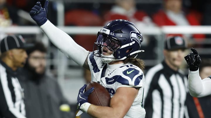 Jan 3, 2026; Santa Clara, California, USA; Seattle Seahawks linebacker Drake Thomas (42) reacts after an interception against the San Francisco 49ers during the second half at Levi's Stadium. Mandatory Credit: Sergio Estrada-Imagn Images