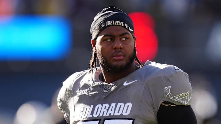 Nov 16, 2024; Boulder, Colorado, USA; Colorado Buffaloes offensive tackle Jordan Seaton (77) looks on before the game against the Utah Utes at Folsom Field. Mandatory Credit: Ron Chenoy-Imagn Images