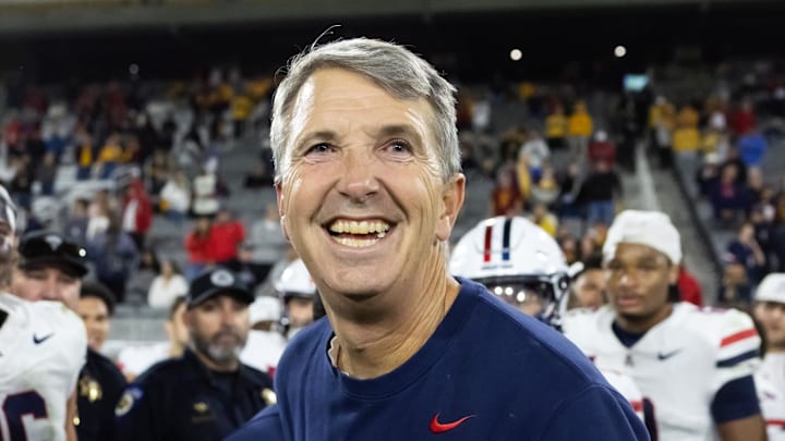 Nov 28, 2025; Tempe, Arizona, USA; Arizona Wildcats head coach Brent Brennan celebrates against the Arizona State Sun Devils during the 99th Territorial Cup at Mountain America Stadium. Mandatory Credit: Mark J. Rebilas-Imagn Images