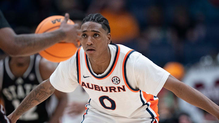 Auburn guard Tahaad Pettiford (0) guards Mississippi State guard Ja'borri McGhee (2) during their 2026 SEC Men’s Basketball Tournament game at Bridgestone Arena in Nashville, Tenn., Wednesday, March 11, 2026.