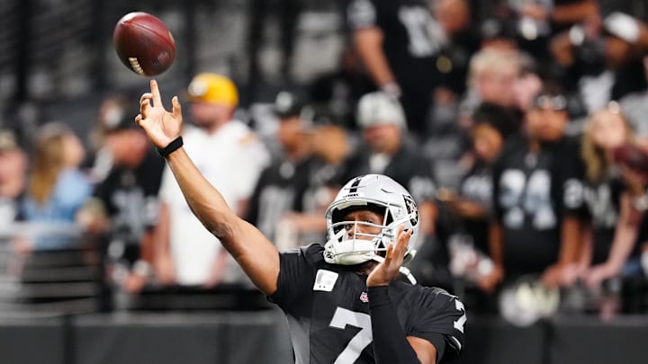 Sep 15, 2025; Paradise, Nevada, USA; Las Vegas Raiders quarterback Geno Smith (7) passes the ball during warm ups before the game against the Los Angeles Chargers at Allegiant Stadium. Mandatory Credit: Stephen R. Sylvanie -Imagn Images