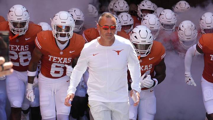 Texas Longhorns Head Coach Steve Sarkisian leads his team on to the field before a game against the Texas State Bobcats at Darrell K Royal-Texas Memorial Stadium. Texas Longhorns Head Coach Steve Sarkisian leads his team on to the field before a game against the Texas State Bobcats at Darrell K Royal-Texas Memorial Stadium.