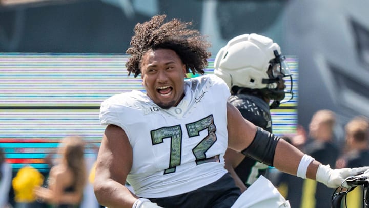 Fighting Ducks offensive lineman Iapani Laloulu celebrates as the Fighting Ducks face off against Mighty Oregon in the Oregon Ducks spring game on April 26, 2025, at Autzen Stadium in Eugene.