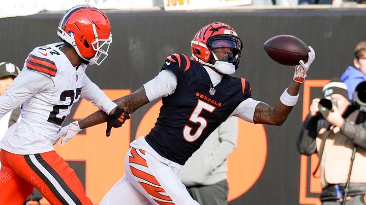 Cincinnati Bengals wide receiver Tee Higgins (5) makes a one handed catch for a touchdown in the second quarter of the NFL Week 18 game between the Cincinnati Bengals and the Cleveland Browns at Paycor Stadium in Downtown Cincinnati on Sunday, Jan. 4, 2026.