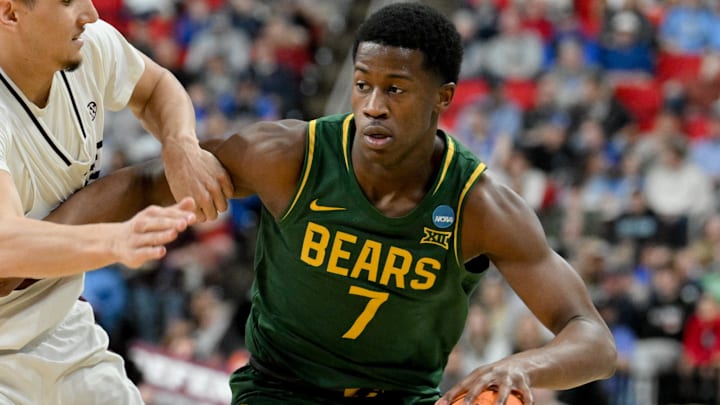Mar 21, 2025; Raleigh, NC, USA; Mississippi State Bulldogs forward RJ Melendez (22) defends against Baylor Bears guard VJ Edgecombe (7) during the second half in the first round of the NCAA Tournament at Lenovo Center. Mandatory Credit: Zachary Taft-Imagn Images