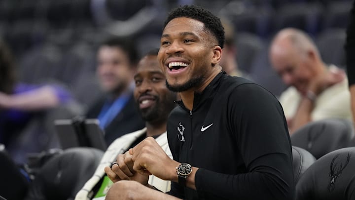 Apr 10, 2026; Milwaukee, Wisconsin, USA;  Milwaukee Bucks forward Giannis Antetokounmpo enjoys a moment during warmups prior to the game against the Brooklyn Nets at Fiserv Forum. Mandatory Credit: Jeff Hanisch-Imagn Images