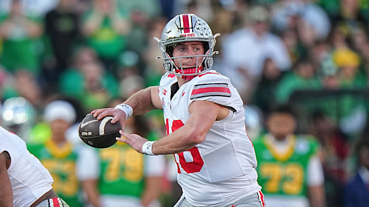 Ohio State quarterback Will Howard looks for a receiver against Oregon in the Rose Bowl.