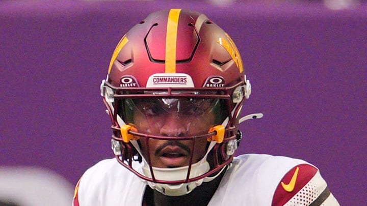 Washington Commanders quarterback Jayden Daniels drops back to pass against the Minnesota Vikings. Washington Commanders quarterback Jayden Daniels drops back to pass against the Minnesota Vikings.