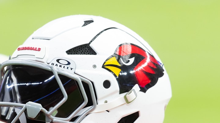 Aug 2, 2025; Glendale, AZ, USA; Detailed view of an Arizona Cardinals helmet during the Red and White practice in training camp at State Farm Stadium. Mandatory Credit: Mark J. Rebilas-Imagn Images