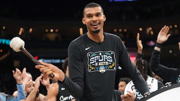 Feb 19, 2026; Austin, Texas, USA; San Antonio Spurs forward Victor Wembanyama (1) leads the crowd in a cheer after a victory over the Phoenix Suns at Moody Center. Mandatory Credit: Scott Wachter-Imagn Images