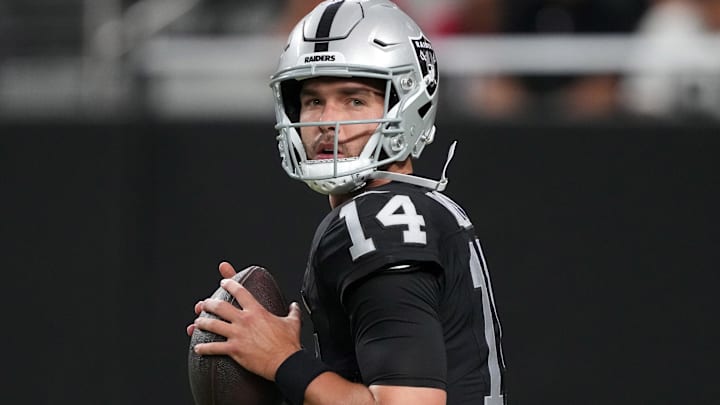 Aug 23, 2024; Paradise, Nevada, USA; Las Vegas Raiders quarterback Carter Bradley (14) throws the ball against the San Francisco 49ers at Allegiant Stadium. Mandatory Credit: Kirby Lee-Imagn Images Aug 23, 2024; Paradise, Nevada, USA; Las Vegas Raiders quarterback Carter Bradley (14) throws the ball against the San Francisco 49ers at Allegiant Stadium. Mandatory Credit: Kirby Lee-Imagn Images