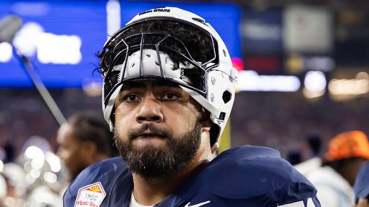 Dec 31, 2024; Glendale, AZ, USA; Penn State Nittany Lions offensive lineman Olaivavega Ioane (71) against the Boise State Broncos during the Fiesta Bowl at State Farm Stadium. Mandatory Credit: Mark J. Rebilas-Imagn Images