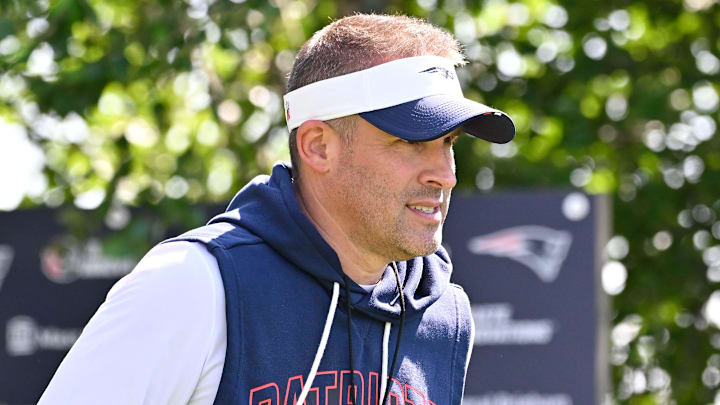 Jul 28, 2025; Foxborough, MA, USA; New England Patriots offensive coordinator Josh McDaniels heads to the practice fields for training camp at Gillette Stadium. Mandatory Credit: Eric Canha-Imagn Images