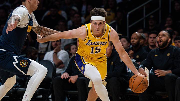 Oct 16, 2026; Los Angeles, California, USA; Los Angeles Lakers guard Austin Reaves (15) drives against Denver Nuggets forward Trevon Brazile (7) in the second quarter at Crypto.com Arena. Mandatory Credit: Jon Endow-Imagn Images Oct 16, 2026; Los Angeles, California, USA; Los Angeles Lakers guard Austin Reaves (15) drives against Denver Nuggets forward Trevon Brazile (7) in the second quarter at Crypto.com Arena. Mandatory Credit: Jon Endow-Imagn Images