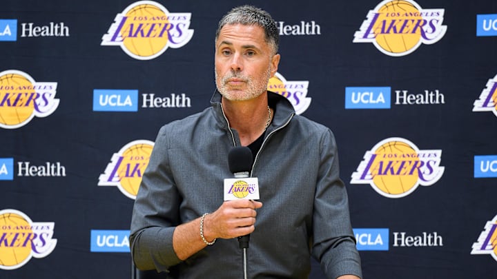 Sep 25, 2025; El Segundo, CA, USA; Los Angeles Lakers general manager Rob Pelinka, left, speaks during a press conference to preview the 2025-26 season at UCLA Health Training Center. Mandatory Credit: William Liang-Imagn Images