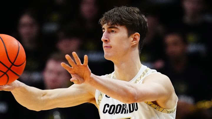 Feb 21, 2026; Boulder, Colorado, USA; Colorado Buffaloes forward Sebastian Rancik (7) passes the ball in the first half against the Oklahoma State Cowboys at the CU Events Center.  