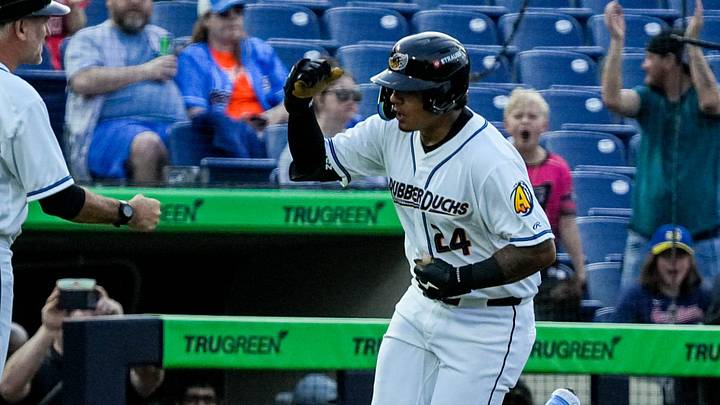 Akron infielder Ralphy Velazquez (24) reacts after hitting a solo home run during the home opening day game against Reading, April 2, 2026, in Akron, Ohio. Akron infielder Ralphy Velazquez (24) reacts after hitting a solo home run during the home opening day game against Reading, April 2, 2026, in Akron, Ohio.