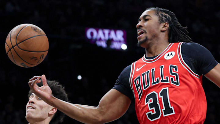 Feb 9, 2026; Brooklyn, New York, USA; Chicago Bulls guard Jaden Ivey (31) is fouled by Brooklyn Nets guard Nolan Traore (88) during the first quarter at Barclays Center. Mandatory Credit: Vincent Carchietta-Imagn Images