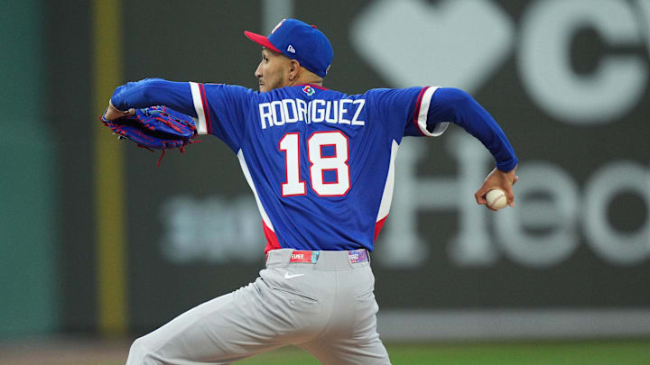 Mar 3, 2026; Lee County, FL, USA; Puerto Rico pitcher Elmer Rodriguez (18) pitches in the first inning against the Boston Red Sox. Mandatory Credit: Jim Rassol-Imagn Images Mar 3, 2026; Lee County, FL, USA; Puerto Rico pitcher Elmer Rodriguez (18) pitches in the first inning against the Boston Red Sox. Mandatory Credit: Jim Rassol-Imagn Images