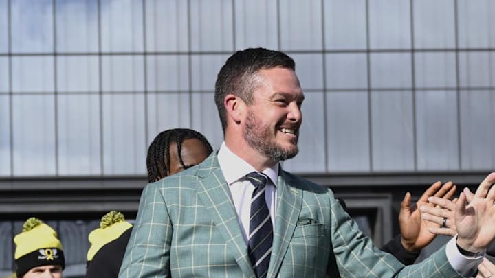 Oct 4, 2024; Eugene, Oregon, USA; Oregon Ducks head coach Dan Lanning high-fives fans before a game against the Michigan State Spartans at Autzen Stadium.  