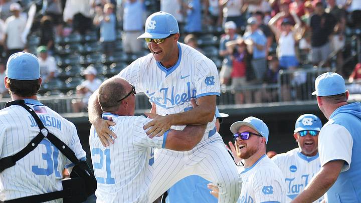 June 7, 2026; Chapel Hill, NC, USA; North Carolina Tar Heels head coach Scott Forbes celebrates a win with the coaching staff against the USC Trojans at Boshamer Stadium. Mandatory Credit: Zachary Taft-Imagn Images June 7, 2026; Chapel Hill, NC, USA; North Carolina Tar Heels head coach Scott Forbes celebrates a win with the coaching staff against the USC Trojans at Boshamer Stadium. Mandatory Credit: Zachary Taft-Imagn Images