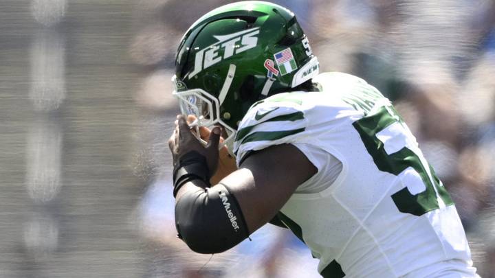 New York Jets edge rusher Kingsley Enagbare (52) celebrates a sack against the Tennessee Titans. New York Jets edge rusher Kingsley Enagbare (52) celebrates a sack against the Tennessee Titans.