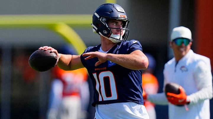 Denver Broncos quarterback Bo Nix (10) prepares to pass the ball during training camp at Broncos Park.