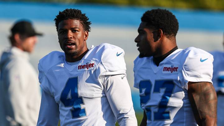 Detroit Lions cornerback D.J. Reed (4) talks with defensive back Christian Izien (27) during training camp