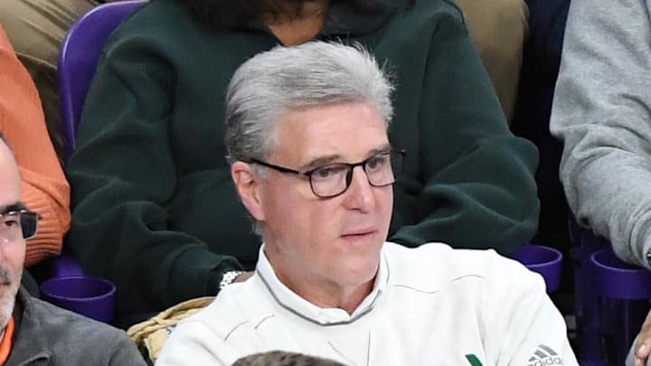 Feb 14, 2024; Clemson, South Carolina, USA;  Miami Athletic Director Dan Radakovich ,right, during the first half at Littlejohn Coliseum Wednesday, February 14, 2024. Mandatory Credit: Ken Ruinard-Imagn Imagesz
