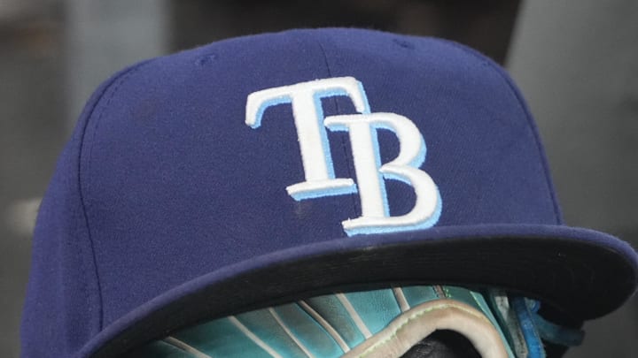 Sep 26, 2025; Toronto, Ontario, CAN; The hat and glove of Tampa Bay Rays third baseman Junior Caminero (13) in the dugout during the game against the Toronto Blue Jays at Rogers Centre. Sep 26, 2025; Toronto, Ontario, CAN; The hat and glove of Tampa Bay Rays third baseman Junior Caminero (13) in the dugout during the game against the Toronto Blue Jays at Rogers Centre.