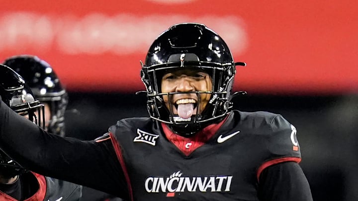 Cincinnati Bearcats linebacker Jonathan Thompson (22) celebrates after a sack during the NCAA college football game between the Cincinnati Bearcats and Kansas Jayhawks on Saturday, Nov. 25, 2023, at Nippert Stadium in Cincinnati. This is the Bearcats last game of the season, as well as their Senior Night Saturday. Cincinnati Bearcats linebacker Jonathan Thompson (22) celebrates after a sack during the NCAA college football game between the Cincinnati Bearcats and Kansas Jayhawks on Saturday, Nov. 25, 2023, at Nippert Stadium in Cincinnati. This is the Bearcats last game of the season, as well as their Senior Night Saturday.