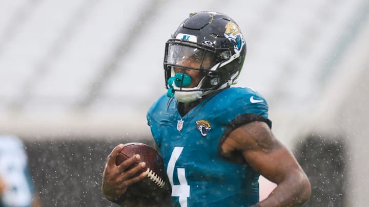 Jacksonville Jaguars running back Tank Bigsby (4) warms up before an NFL football matchup Sunday, Dec. 29, 2024 at EverBank Stadium in Jacksonville, Fla. The Jaguars held off the Titans 20-13. [Corey Perrine/Florida Times-Union]