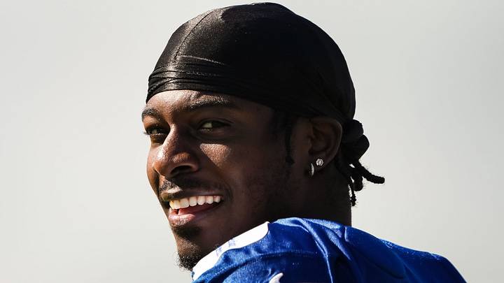 Indianapolis Colts linebacker Akeem Davis-Gaither walks up the field