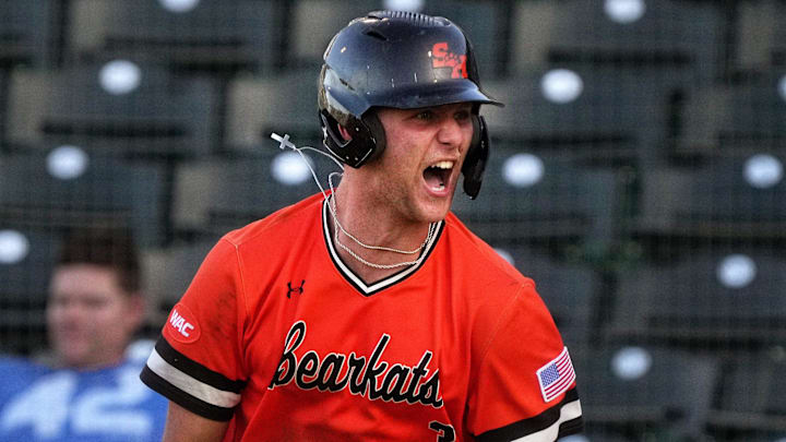 May 26, 2023; Mesa, AZ, USA; Sam Houston Bearkats' Walker Janek (3) celebrates his 3-run home run against the GCU Lobos during their WAC Tournament game at Hohokam Stadium.