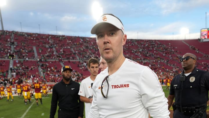 Nov 30, 2024; Los Angeles, California, USA; Southern California Trojans head coach Lincoln Riley leaves the field after the game against the Notre Dame Fighting Irish at United Airlines Field at Los Angeles Memorial Coliseum. Mandatory Credit: Kirby Lee-Imagn Images Nov 30, 2024; Los Angeles, California, USA; Southern California Trojans head coach Lincoln Riley leaves the field after the game against the Notre Dame Fighting Irish at United Airlines Field at Los Angeles Memorial Coliseum. Mandatory Credit: Kirby Lee-Imagn Images