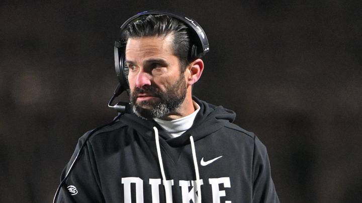 Nov 29, 2025; Durham, North Carolina, USA; Duke Blue Devils head coach Manny Diaz looks on against the Wake Forest Demon Deacons during the fourth quarter at Wallace Wade Stadium. Mandatory Credit: Zachary Taft-Imagn Images Nov 29, 2025; Durham, North Carolina, USA; Duke Blue Devils head coach Manny Diaz looks on against the Wake Forest Demon Deacons during the fourth quarter at Wallace Wade Stadium. Mandatory Credit: Zachary Taft-Imagn Images