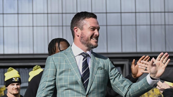 Oct 4, 2024; Eugene, Oregon, USA; Oregon Ducks head coach Dan Lanning high-fives fans before a game against the Michigan State Spartans at Autzen Stadium. Mandatory Credit: Troy Wayrynen-Imagn Images