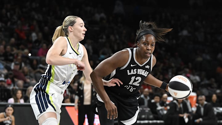 Jun 13, 2025; Las Vegas, Nevada, USA; Las Vegas Aces guard Chelsea Gray (12) drives past Dallas Wings guard Paige Bueckers (5) in the second quarter of their game at Michelob Ultra Arena. Mandatory Credit: Candice Ward-Imagn Images Jun 13, 2025; Las Vegas, Nevada, USA; Las Vegas Aces guard Chelsea Gray (12) drives past Dallas Wings guard Paige Bueckers (5) in the second quarter of their game at Michelob Ultra Arena. Mandatory Credit: Candice Ward-Imagn Images