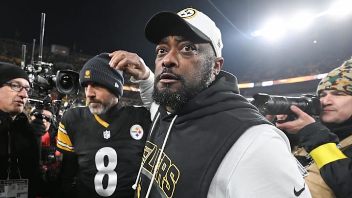 Jan 4, 2026; Pittsburgh, Pennsylvania, USA; Pittsburgh Steelers head coach Mike Tomlin and quarterback Aaron Rodgers (8) celebrate after defeating the Baltimore Ravens at Acrisure Stadium. Mandatory Credit: Barry Reeger-Imagn Images
