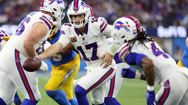 Buffalo Bills QB Josh Allen hands the ball off to RB James Cook during the third quarter against the Los Angeles Chargers. Buffalo Bills QB Josh Allen hands the ball off to RB James Cook during the third quarter against the Los Angeles Chargers.