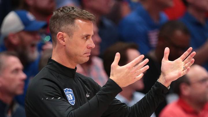 Duke Blue Devils head coach Jon Scheyer makes calls during the exhibition game against Kansas Jayhawks inside Allen Fieldhouse in Lawrence, Kansas on Oct. 25, 2026. Duke Blue Devils head coach Jon Scheyer makes calls during the exhibition game against Kansas Jayhawks inside Allen Fieldhouse in Lawrence, Kansas on Oct. 25, 2026.