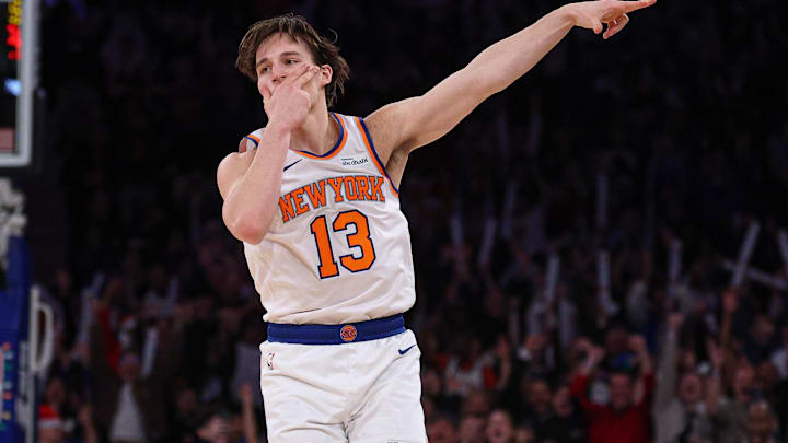 Dec 25, 2025; New York, New York, USA; New York Knicks guard Tyler Kolek (13) reacts after making a three point basket during the second half against the Cleveland Cavaliers at Madison Square Garden. Mandatory Credit: Vincent Carchietta-Imagn Images