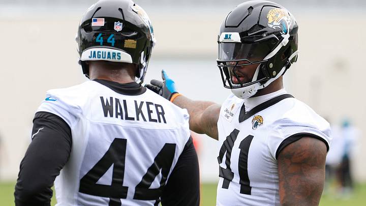 Jacksonville Jaguars defensive end Travon Walker (44) and defensive end Josh Hines-Allen (41) talk during the first day of minicamp at the Miller Electric Center, Tuesday, June 9, 2026, in Jacksonville, Fla. Jacksonville Jaguars defensive end Travon Walker (44) and defensive end Josh Hines-Allen (41) talk during the first day of minicamp at the Miller Electric Center, Tuesday, June 9, 2026, in Jacksonville, Fla.