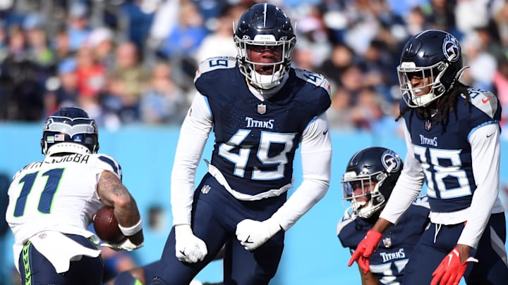 Dec 24, 2023; Nashville, Tennessee, USA; Tennessee Titans linebacker Arden Key (49) celebrates after a defensive stop during the first half against the Seattle Seahawks at Nissan Stadium. Mandatory Credit: Christopher Hanewinckel-Imagn Images