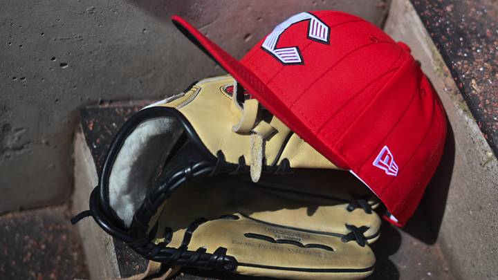Apr 11, 2026; Cincinnati, Ohio, USA;  A view of an official Cincinnati Reds hat on the dugout steps during the game against the Los Angeles Angels at Great American Ball Park. Mandatory Credit: Aaron Doster-Imagn Images