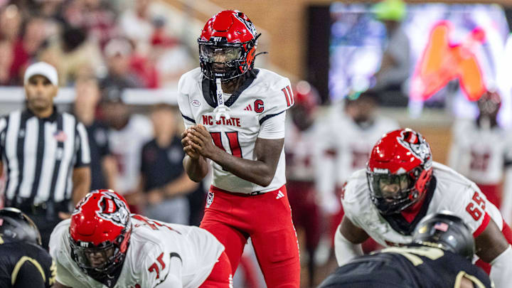 Sep 11, 2025; Winston-Salem, North Carolina, USA;  North Carolina State Wolfpack quarterback CJ Bailey (11) awaits a snap in first half against the Wake Forest Demon Deacons at Allegacy Federal Credit Union Stadium. Mandatory Credit: Luke Jamroz-Imagn Images