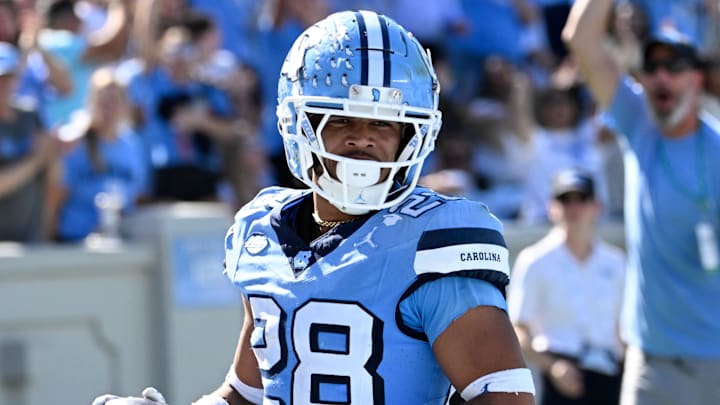 Oct 12, 2024; Chapel Hill, North Carolina, USA; North Carolina Tar Heels running back Omarion Hampton (28) runs for a touchdown in the third quarter at Kenan Memorial Stadium. Mandatory Credit: Bob Donnan-Imagn Images